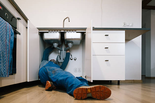 Professional Drain Cleaning technician working in Watkins, CO